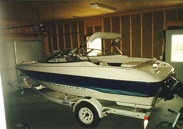 Bayliner 1750 ski boat (parked in garage)