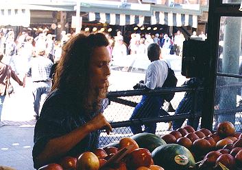 Lynn picks an apple
