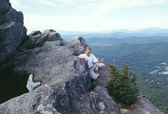 me sitting on edge of cliff on Grandfather Mountain